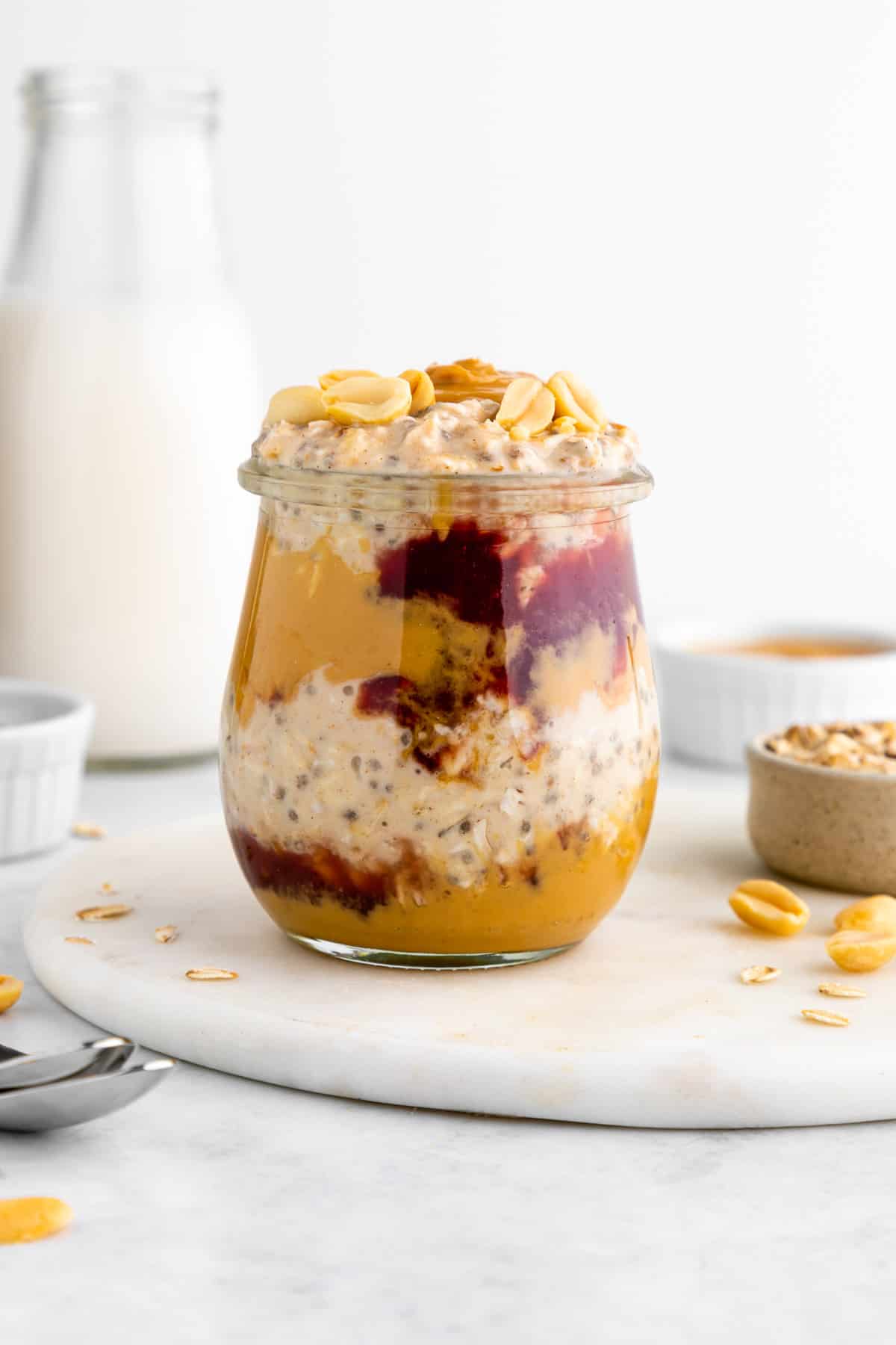 peanut butter and jelly overnight oats inside a glass weck jar