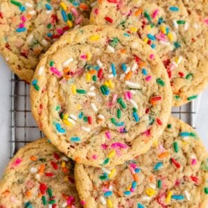 close up of vegan funfetti cookies on a wire cooling rack