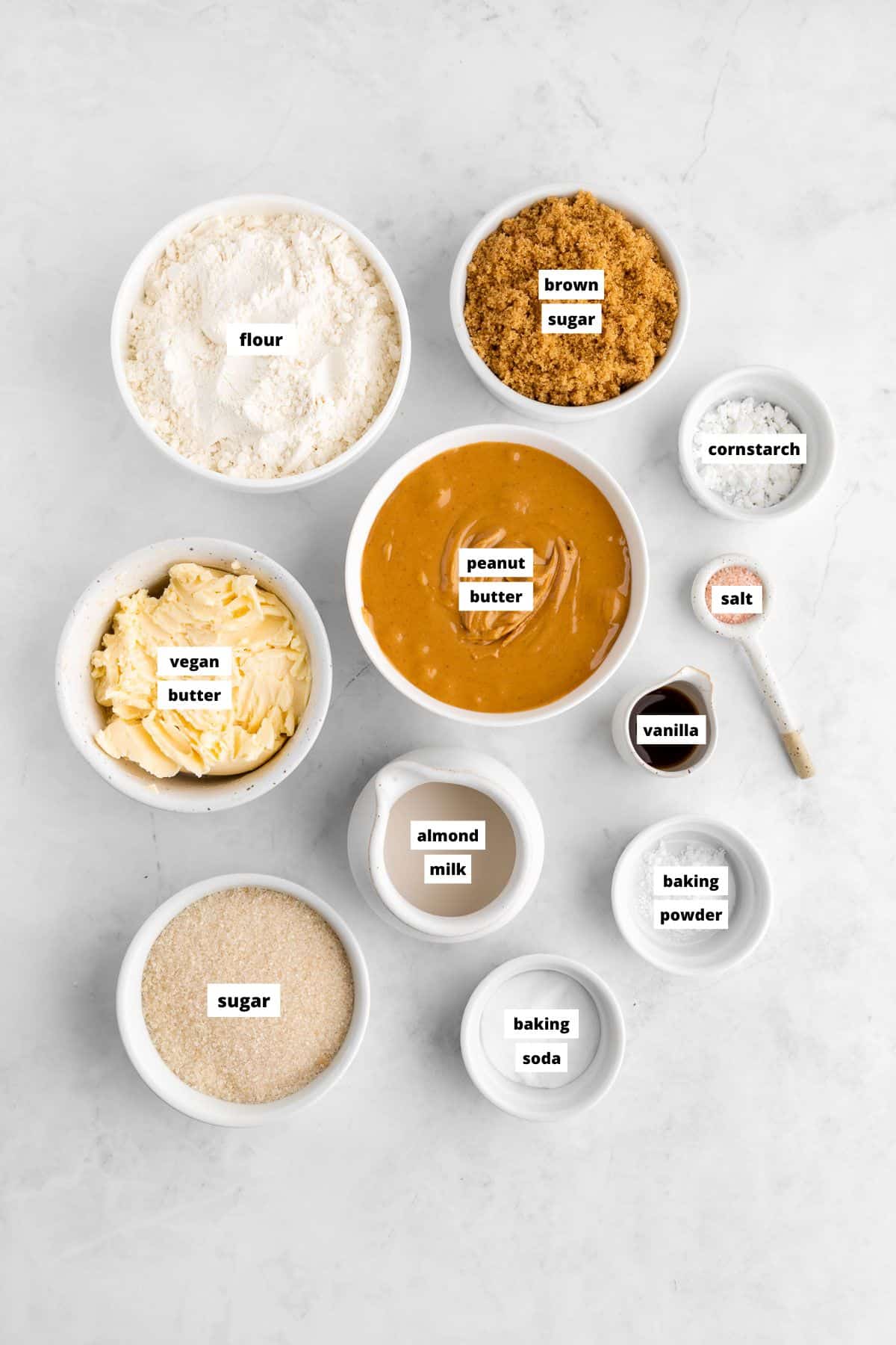 bowls of ingredients for vegan peanut butter cookies