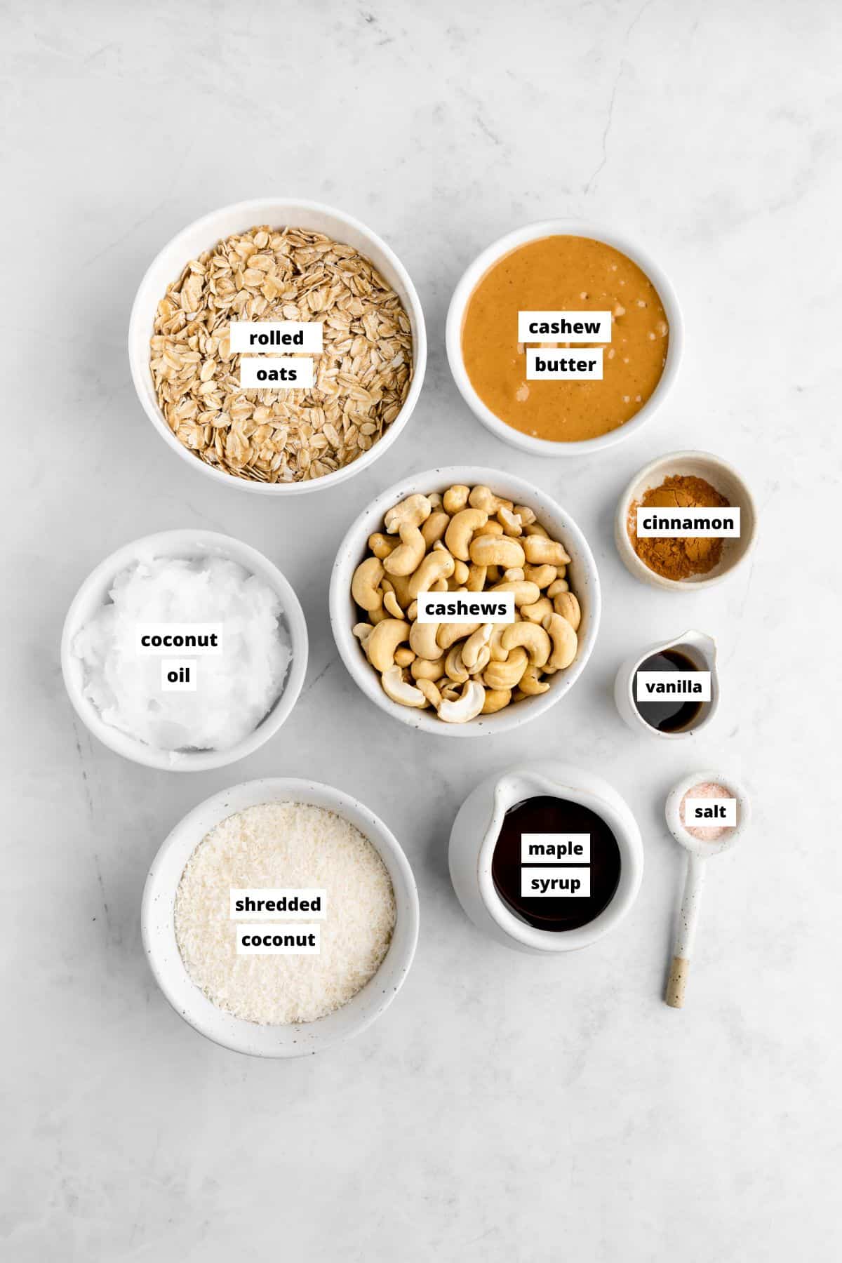 bowls of ingredients for homemade cashew butter granola