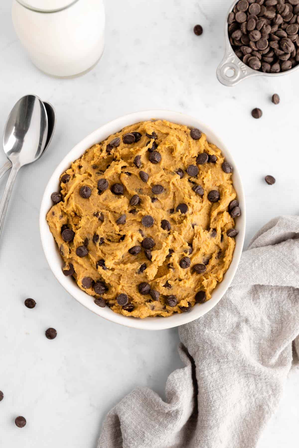 chocolate chip chickpea cookie dough inside a white bowl