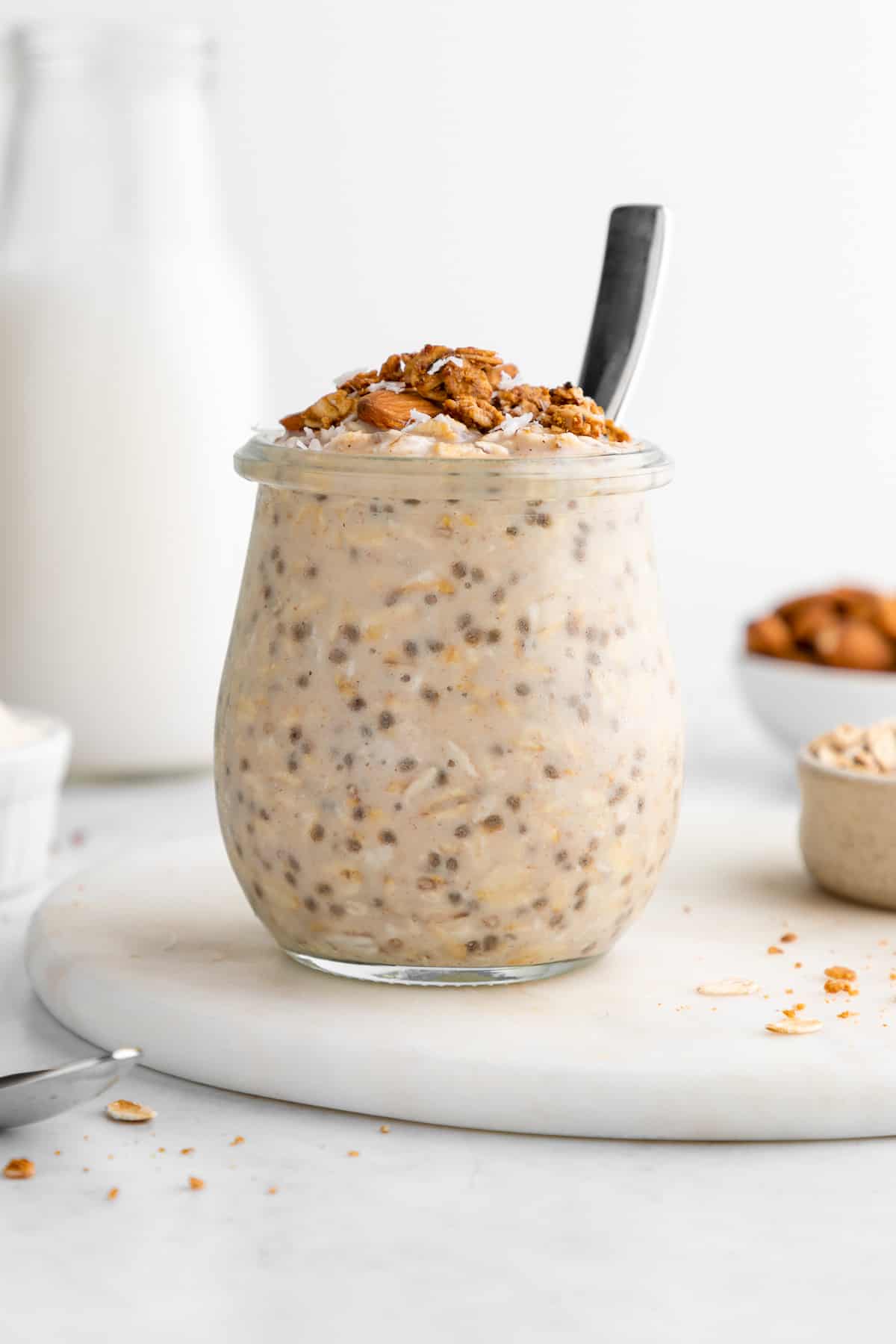 protein overnight oats in a jar with a spoon