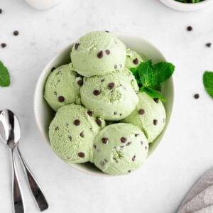 scoops of vegan mint chocolate chip ice cream in a bowl