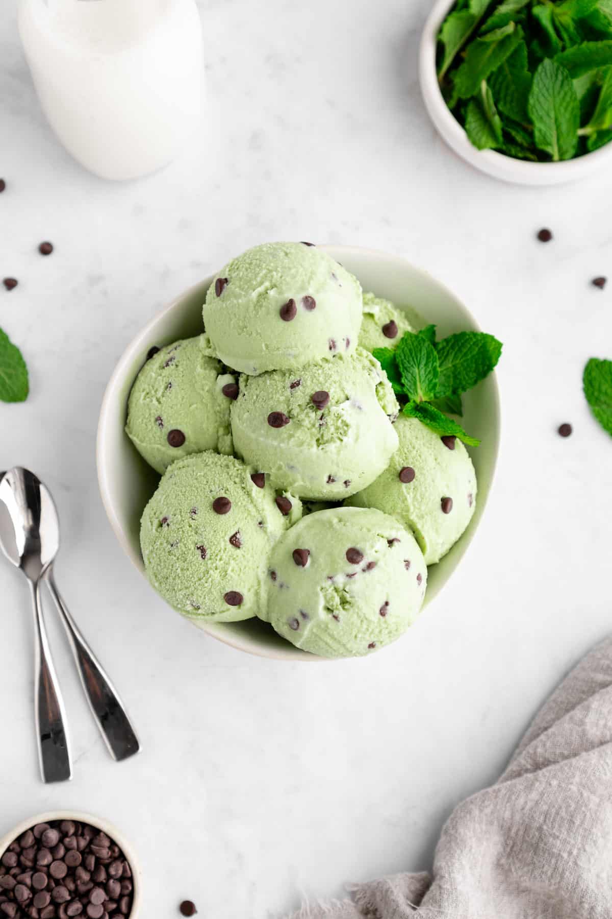 scoops of vegan mint chocolate chip ice cream in a bowl