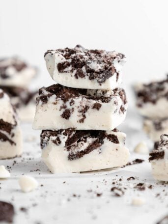 a stack of white chocolate cookies and cream bark