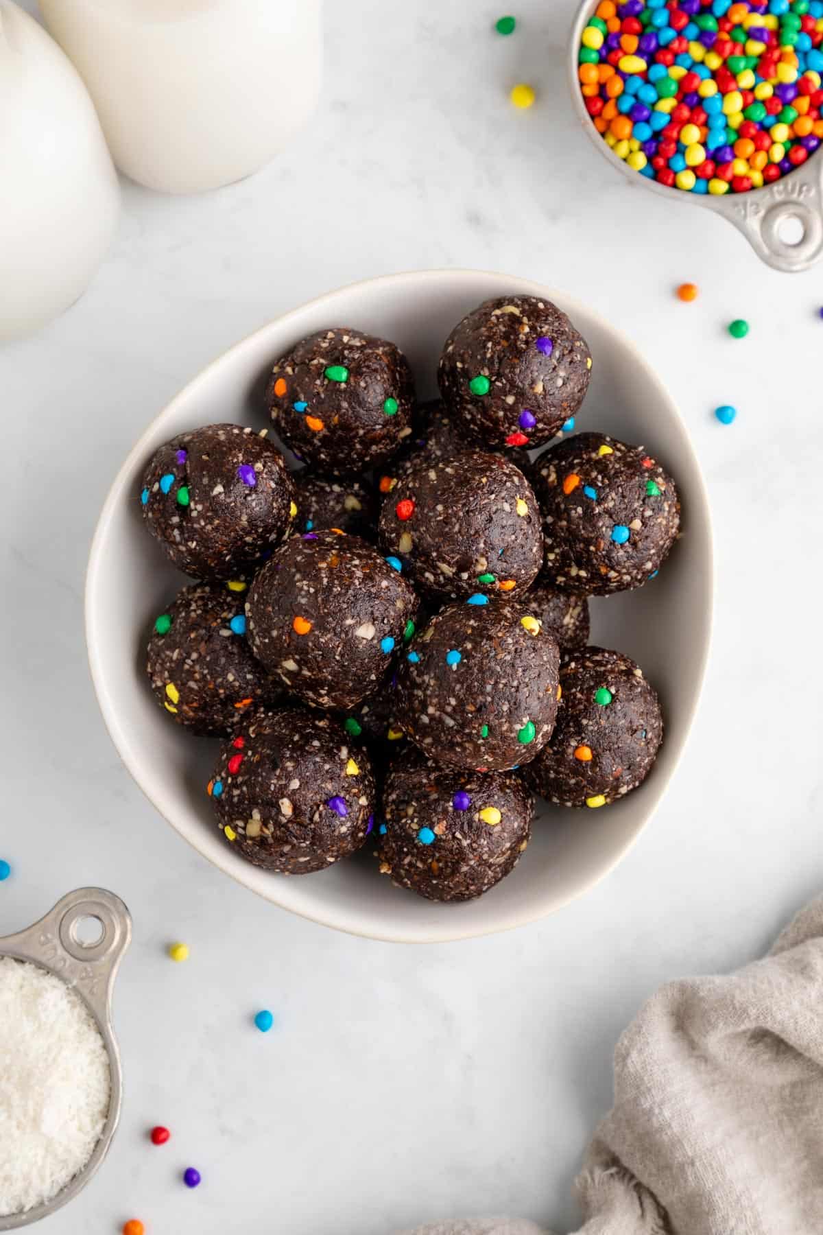 a bowl of healthy cosmic brownie balls