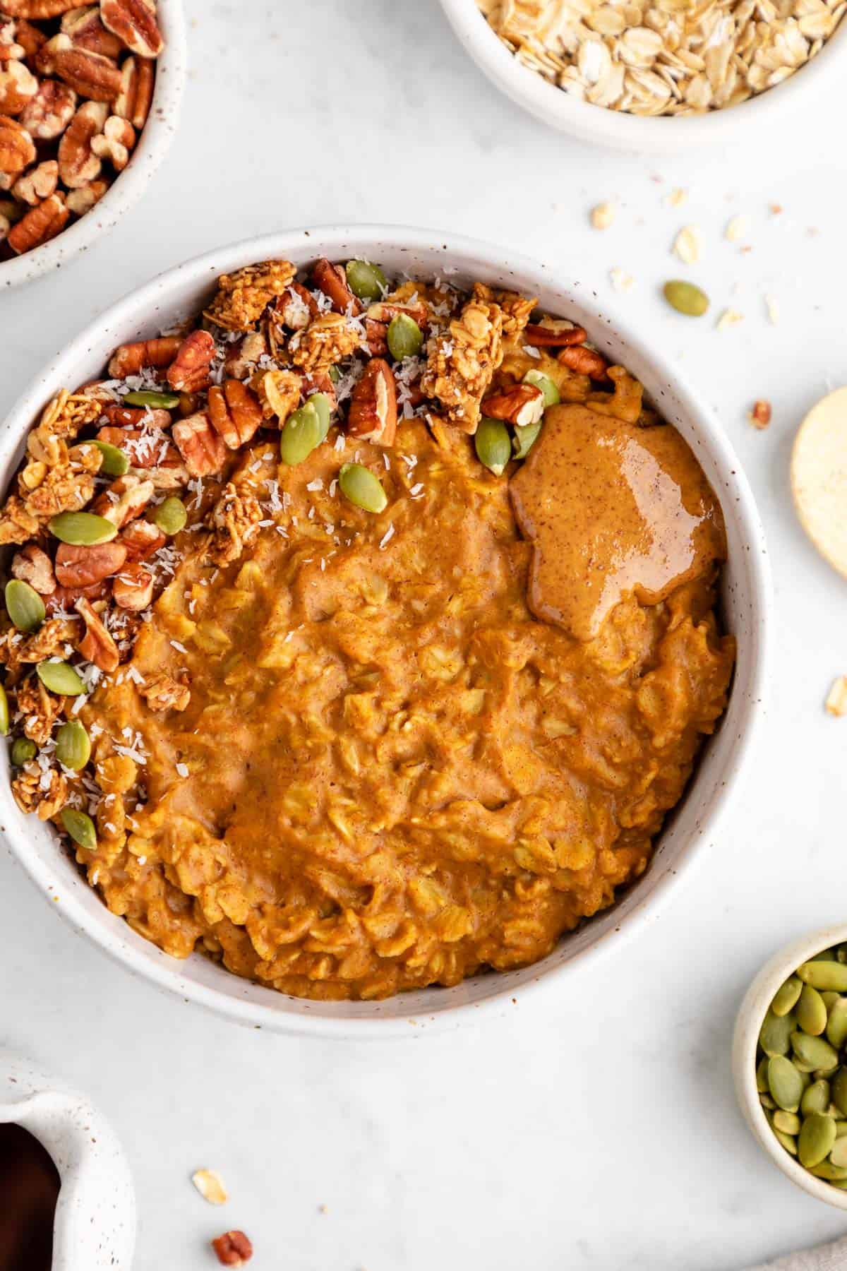 close up photo of healthy pumpkin oatmeal in a bowl