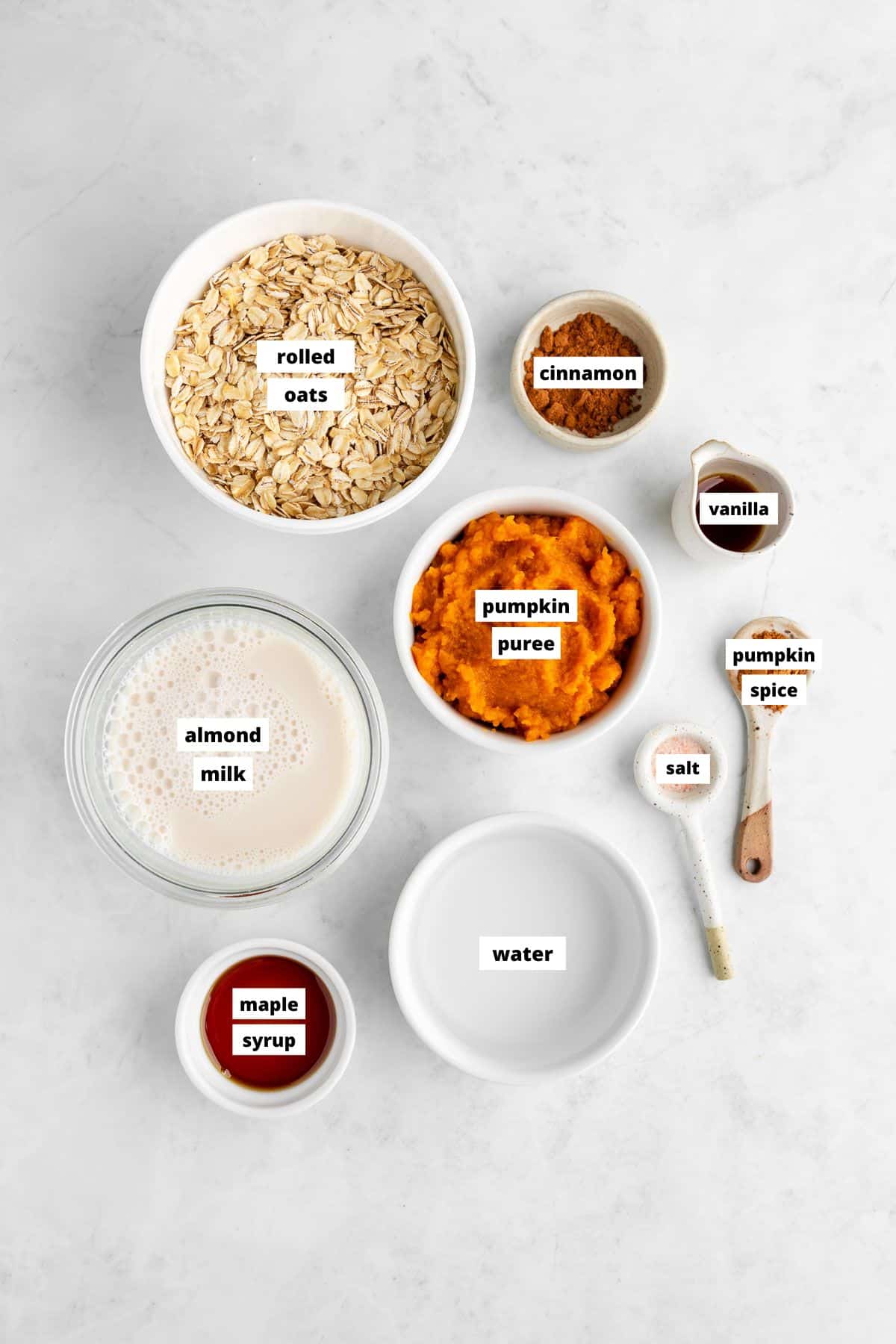 bowls of ingredients for vegan healthy pumpkin oatmeal