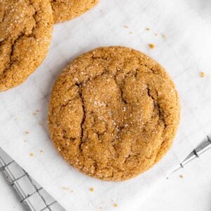 a close up of vegan brown sugar cookies on a wire cooling rack