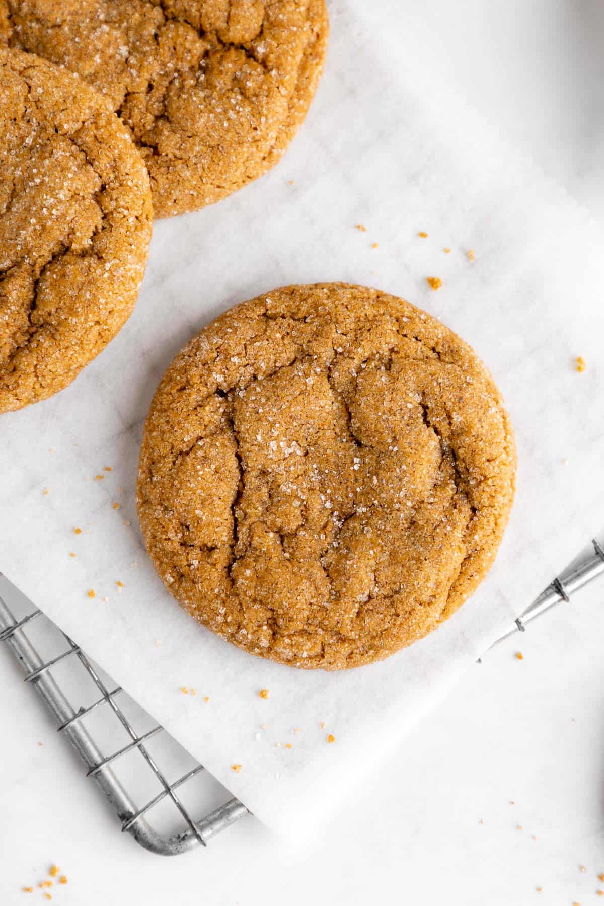 a close up of vegan brown sugar cookies on a wire cooling rack