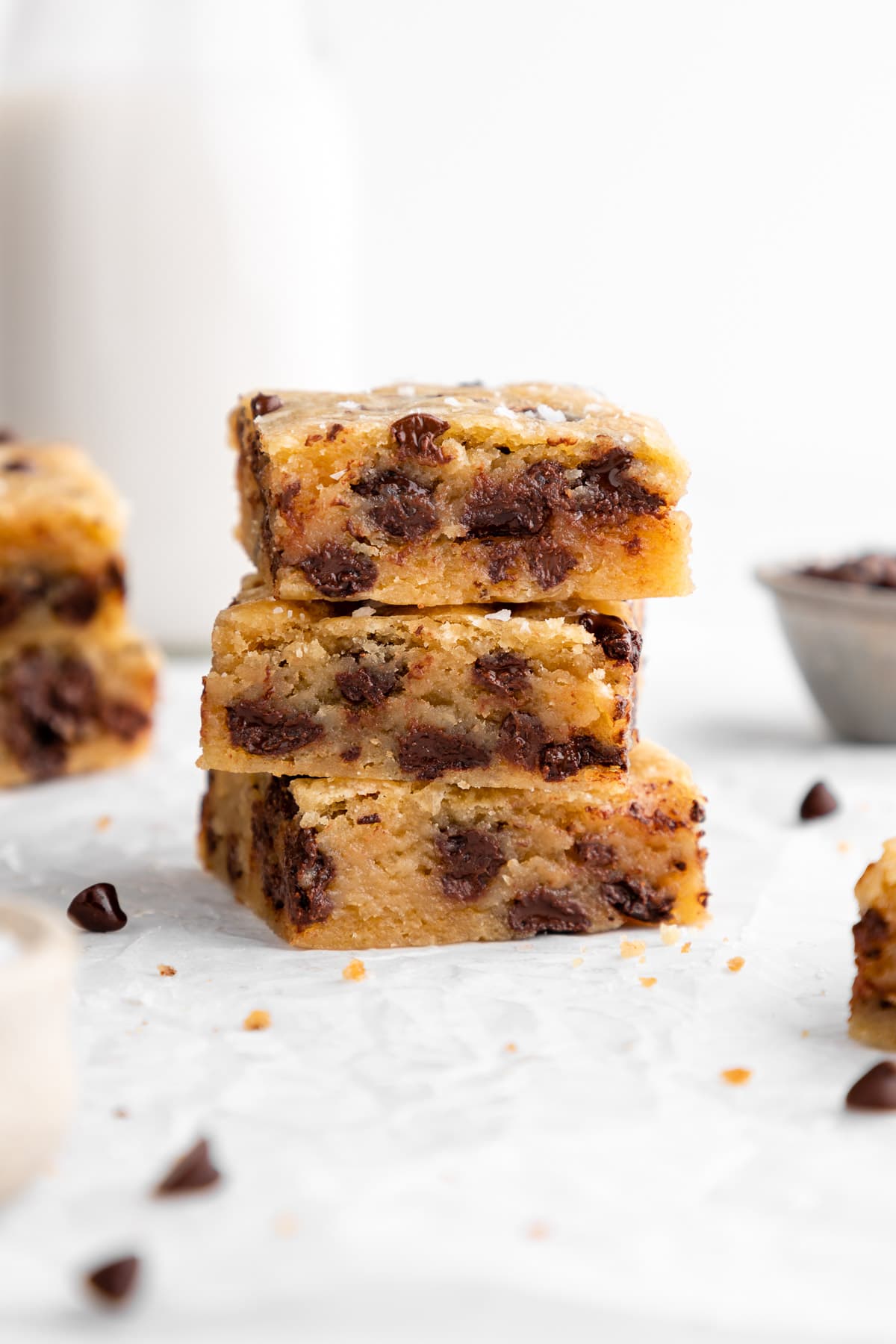 a stack of three vegan chocolate chip blondies