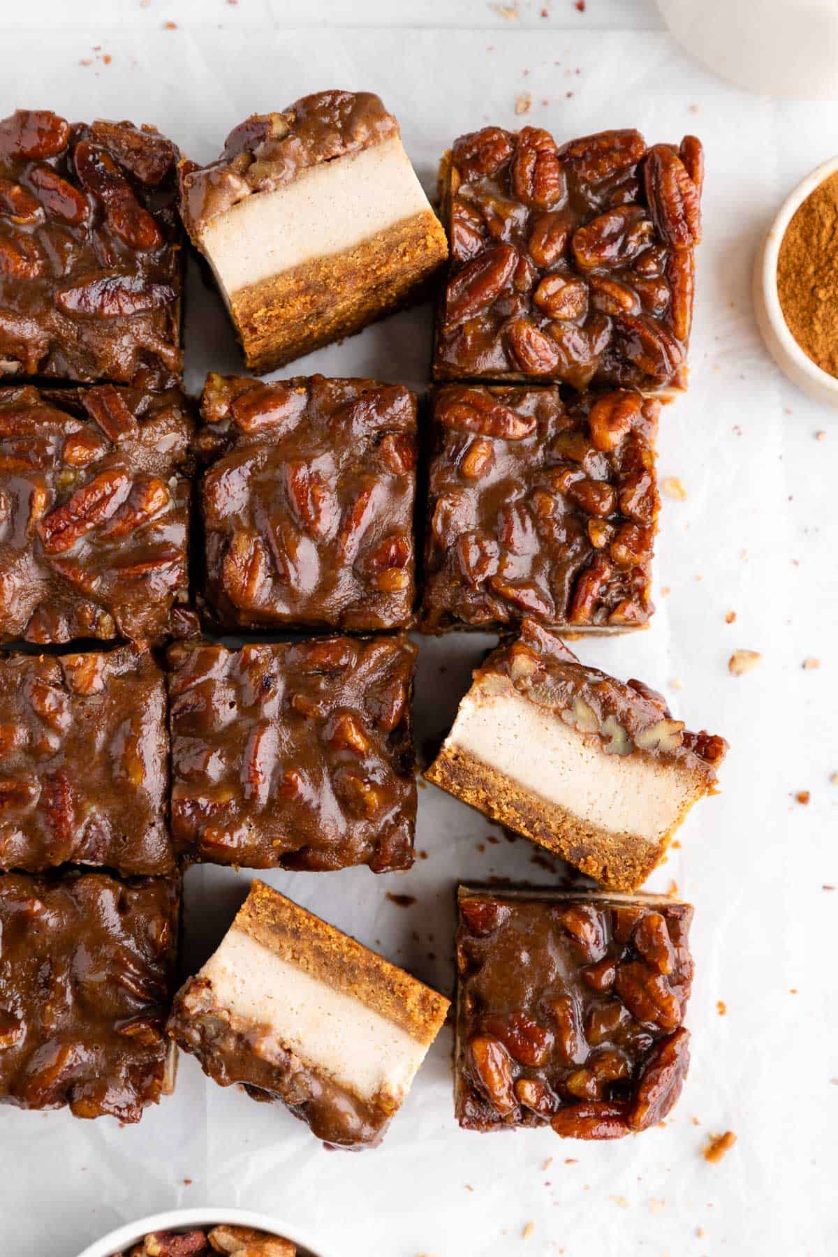 squares of vegan pecan pie cheesecake bars