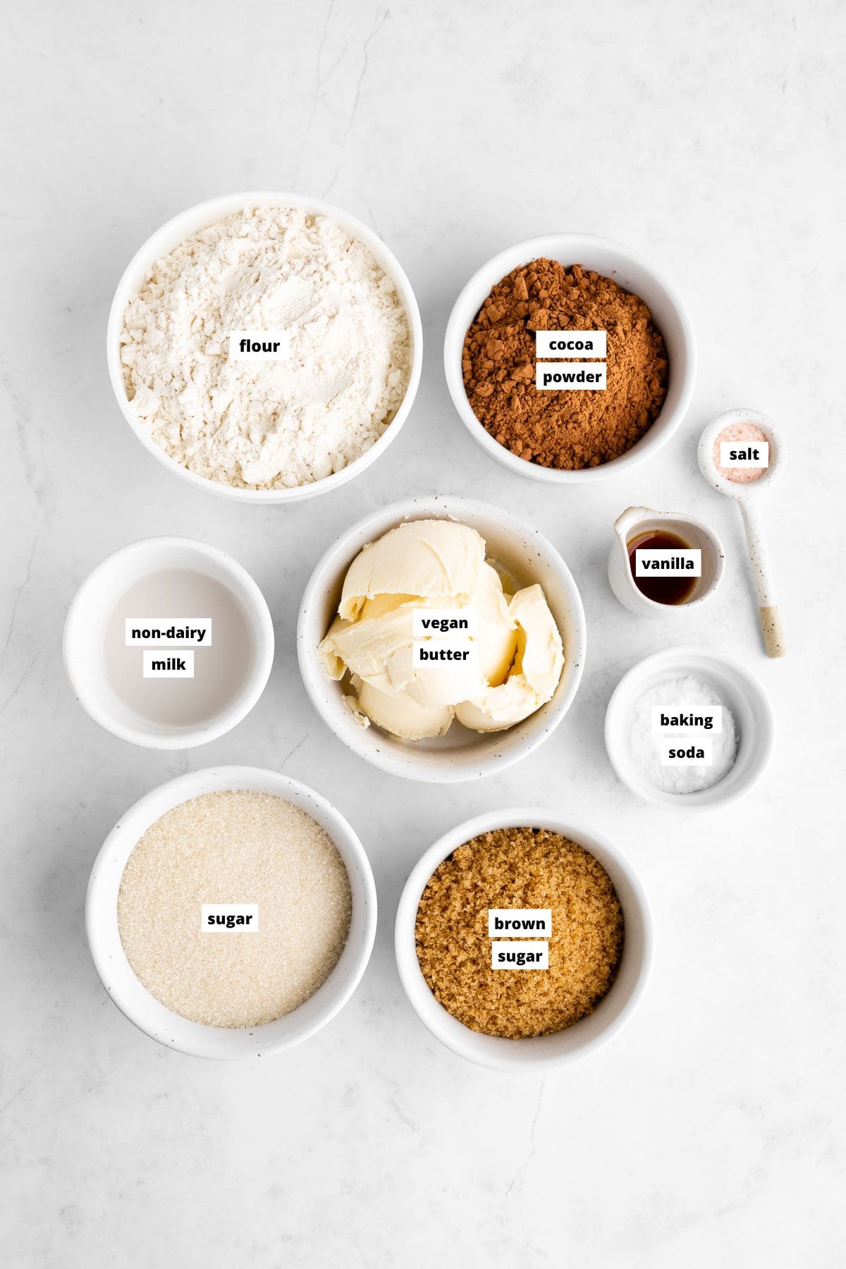bowls of ingredients for vegan chocolate sugar cookies