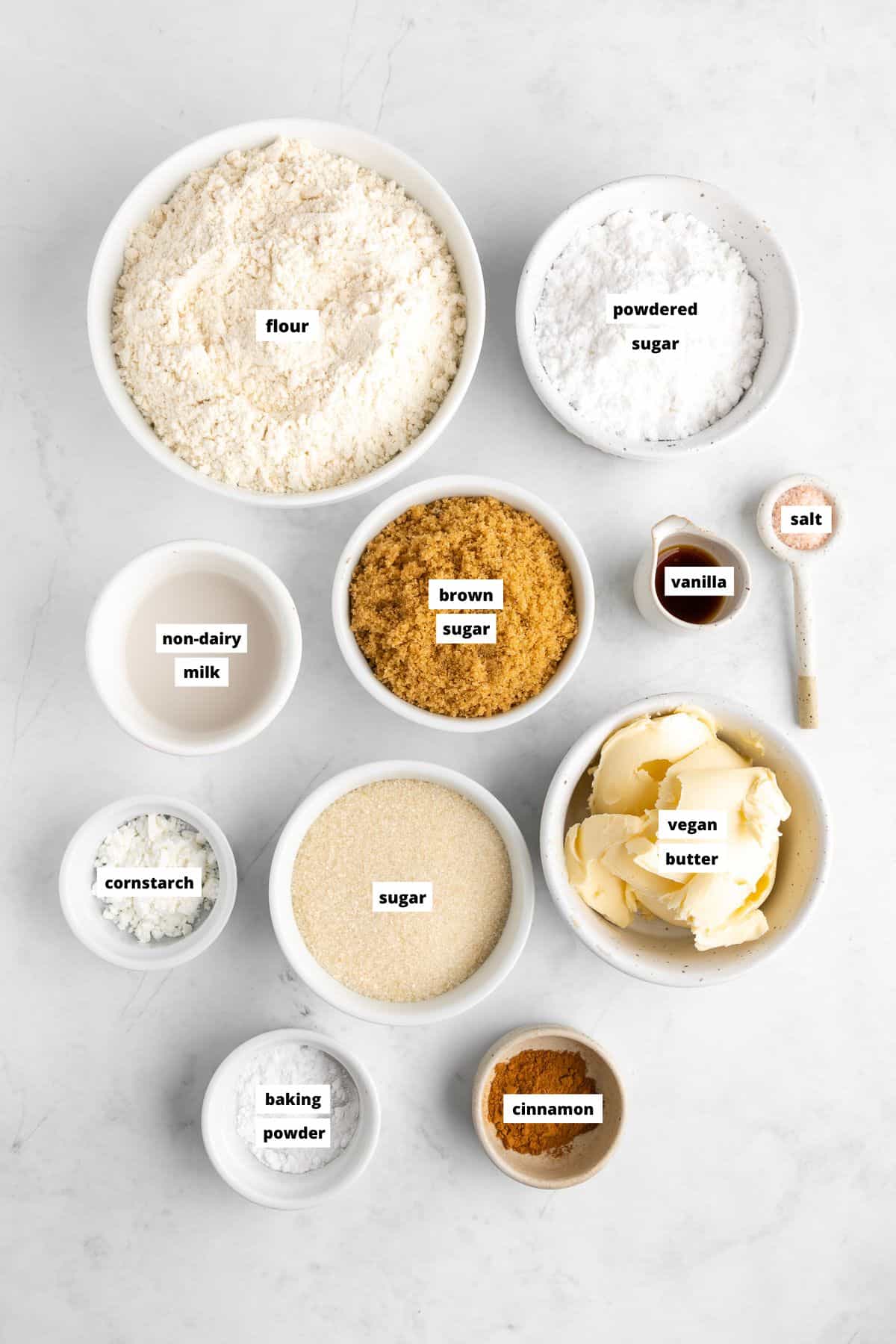 bowls of ingredients for vegan cinnamon roll blondies
