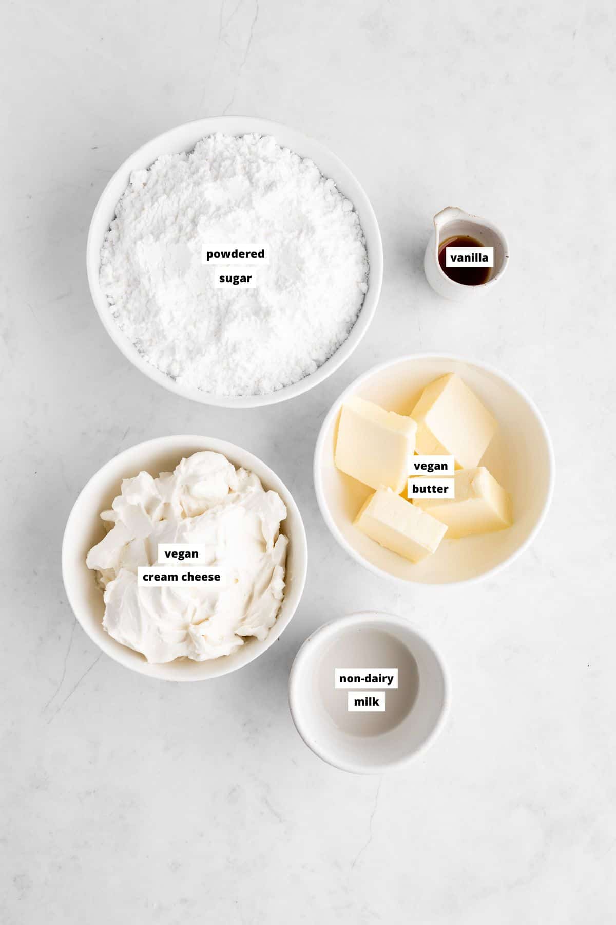 bowls of ingredients for homemade vegan cream cheese frosting