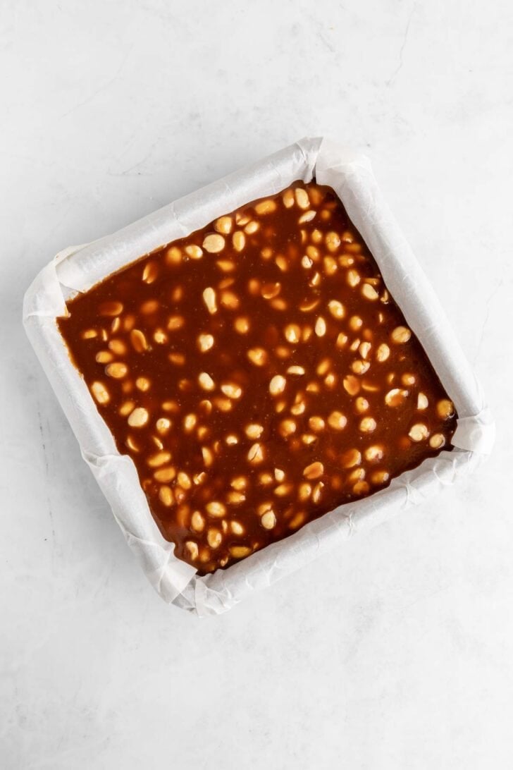 peanut caramel spread in a square baking dish