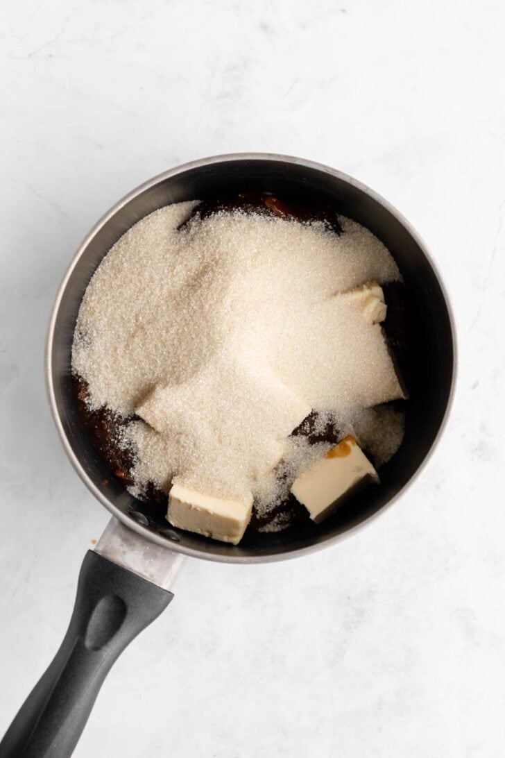 vegan butter, sugar, and caramel sweetened condensed coconut milk inside a pot