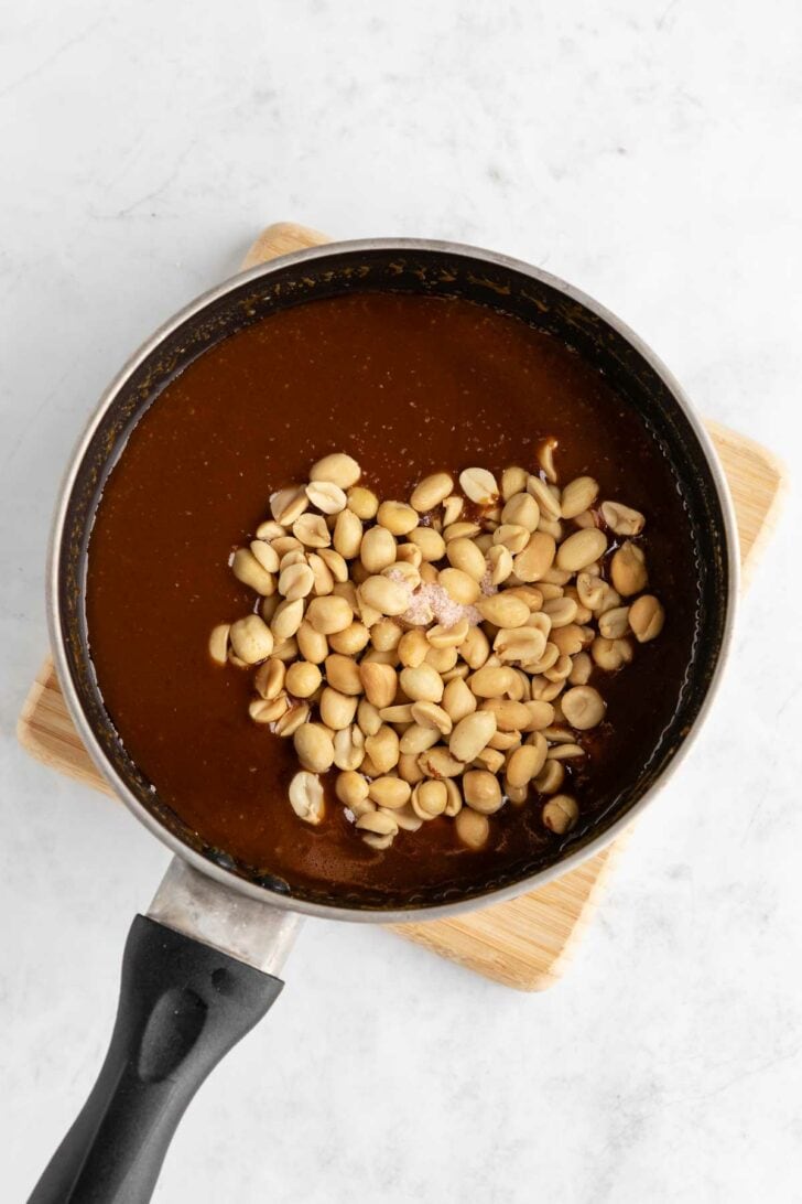 roasted peanuts and caramel inside a pot