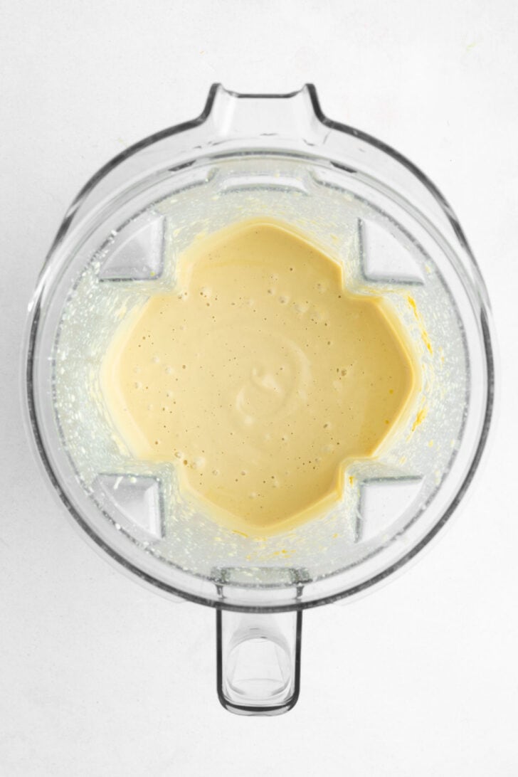 vegan fettuccine alfredo sauce inside a Vitamix blender