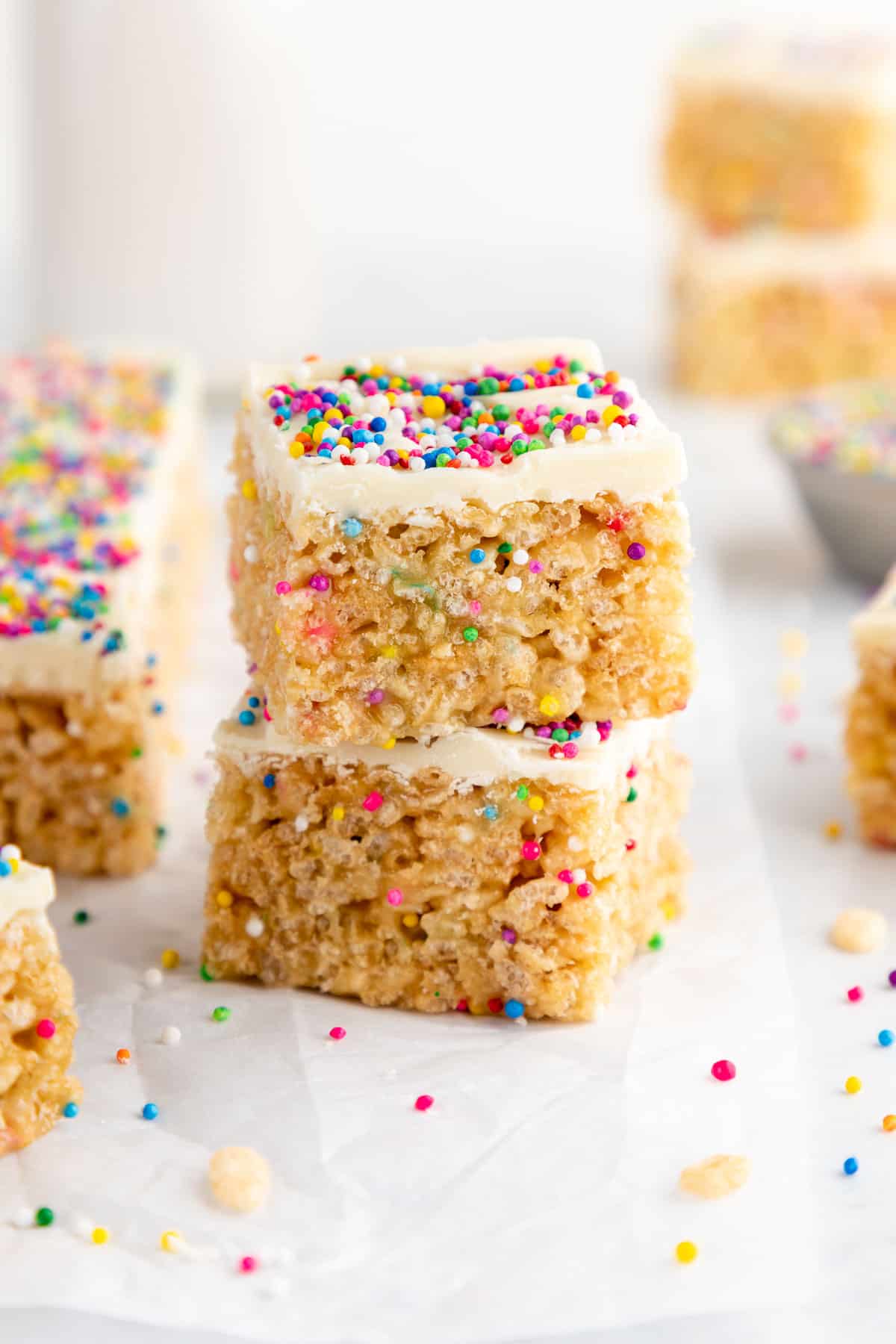 a stack of two birthday cake rice krispie treats with sprinkles