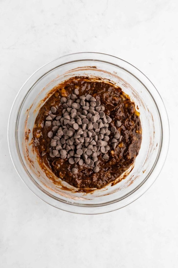 vegan banana brownies batter inside a glass bowl