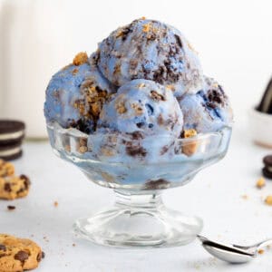 homemade vegan cookie monster ice cream in a glass bowl