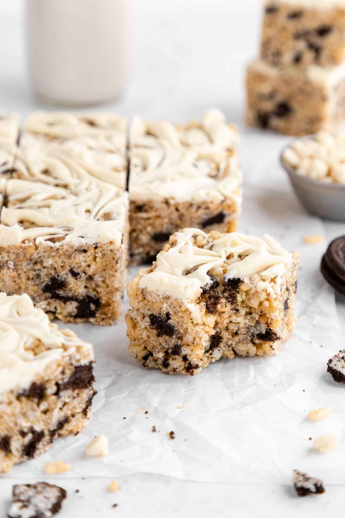 a vegan oreo rice krispie treat with a biten taken out of it