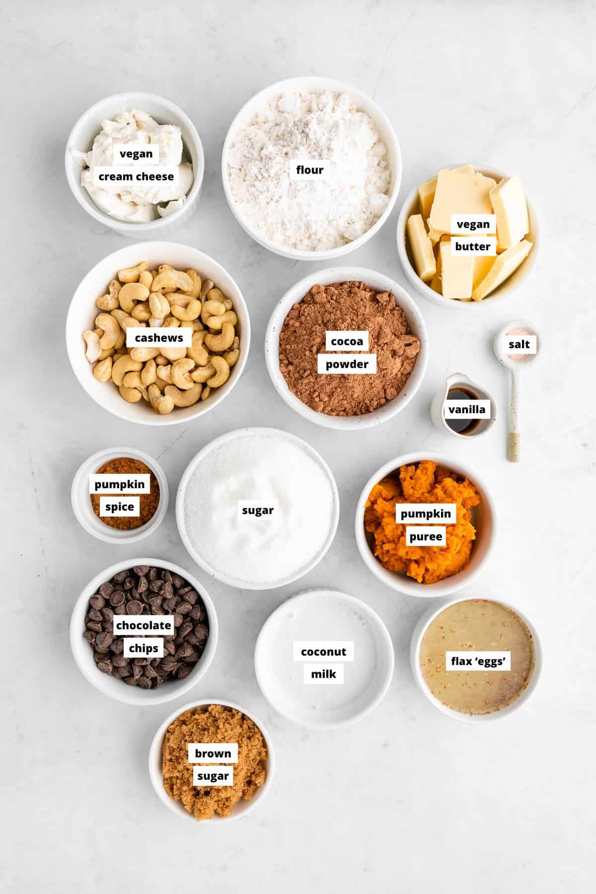 bowls of ingredients for vegan pumpkin cheesecake brownies