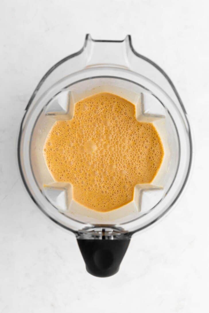 vegan pumpkin ice cream batter inside a Vitamix blender
