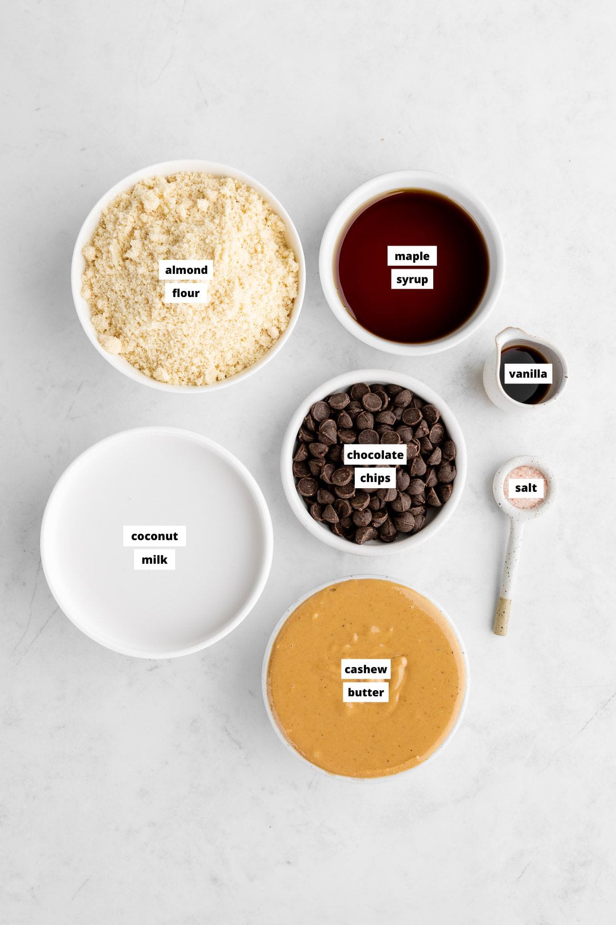 bowls of ingredients for a healthy no-bake cookie dough tart