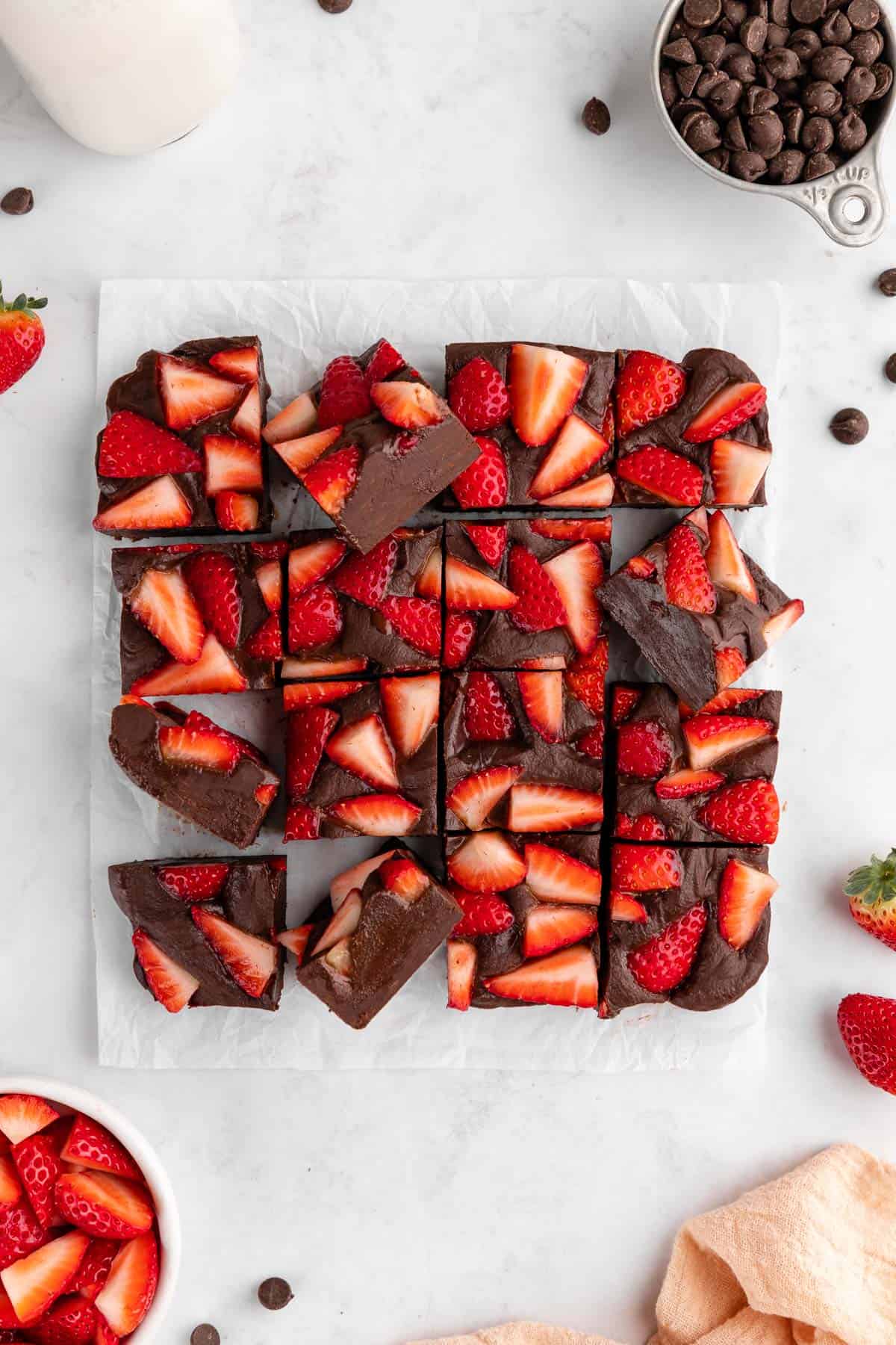 a pile of vegan chocolate strawberry fudge squares