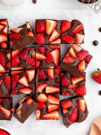 a pile of vegan chocolate strawberry fudge squares