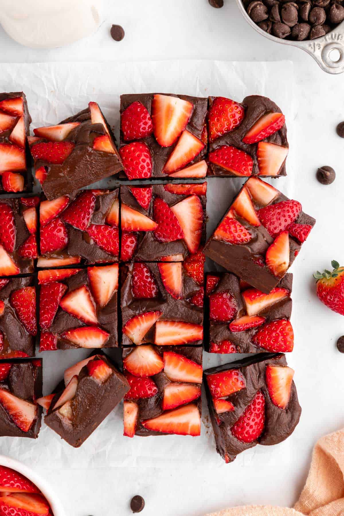 a pile of vegan chocolate strawberry fudge squares
