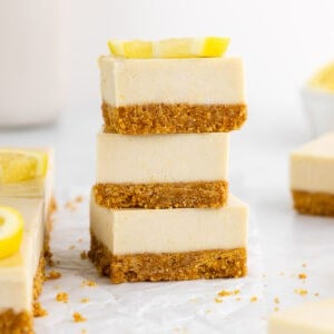 a stack of no-bake lemon cheesecake bars