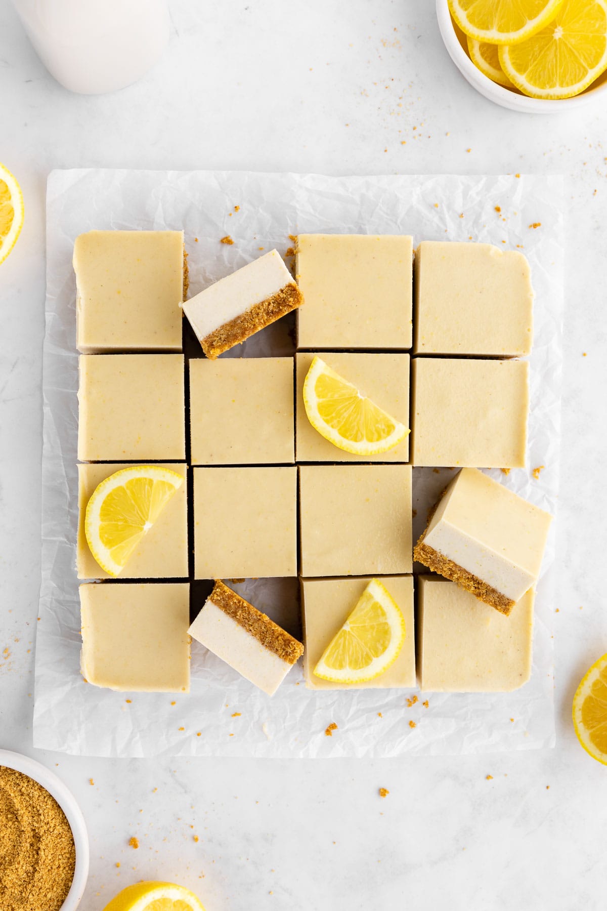 a pile of no-bake lemon cheesecake bars