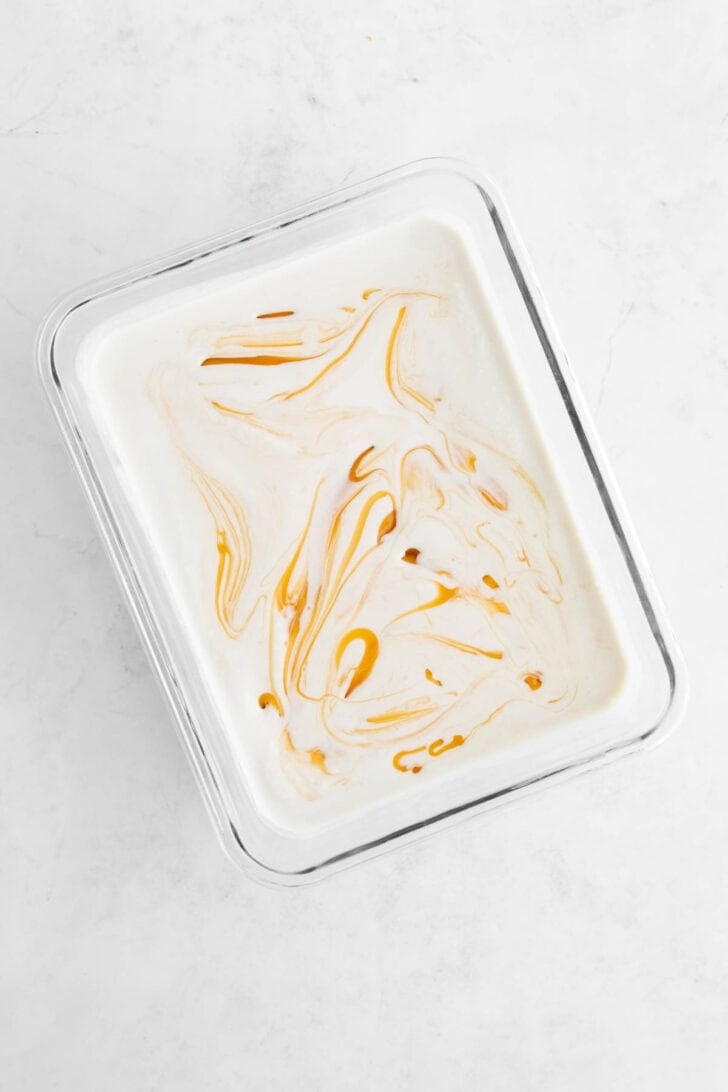 dairy-free salted caramel ice cream inside a glass dish