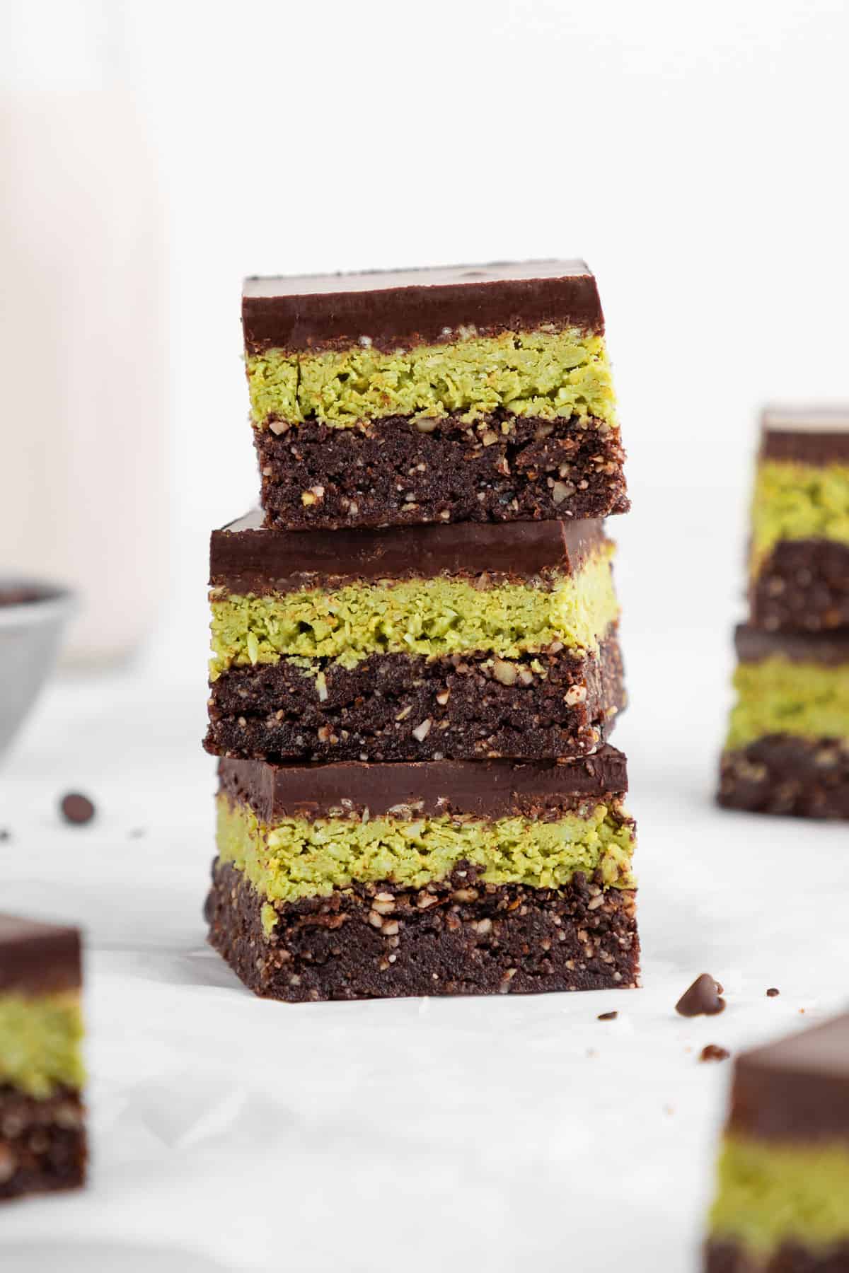 a stack of three no-bake dubai chocolate brownies