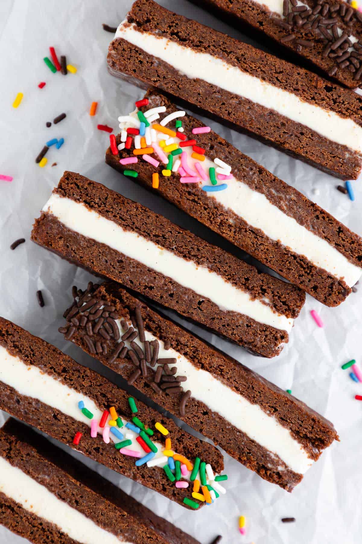 a close up of vegan homemade ice cream sandwiches with coconut milk ice cream and sprinkles