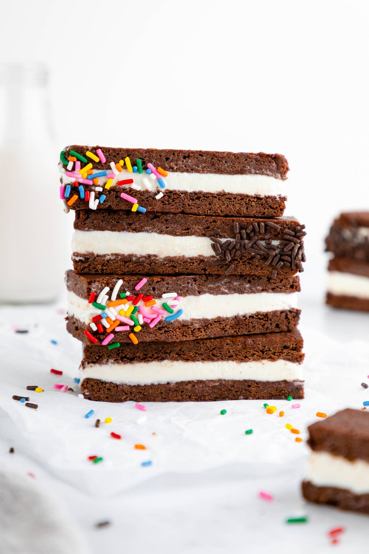 a stack of vegan homemade ice cream sandwiches with coconut milk ice cream and sprinkles