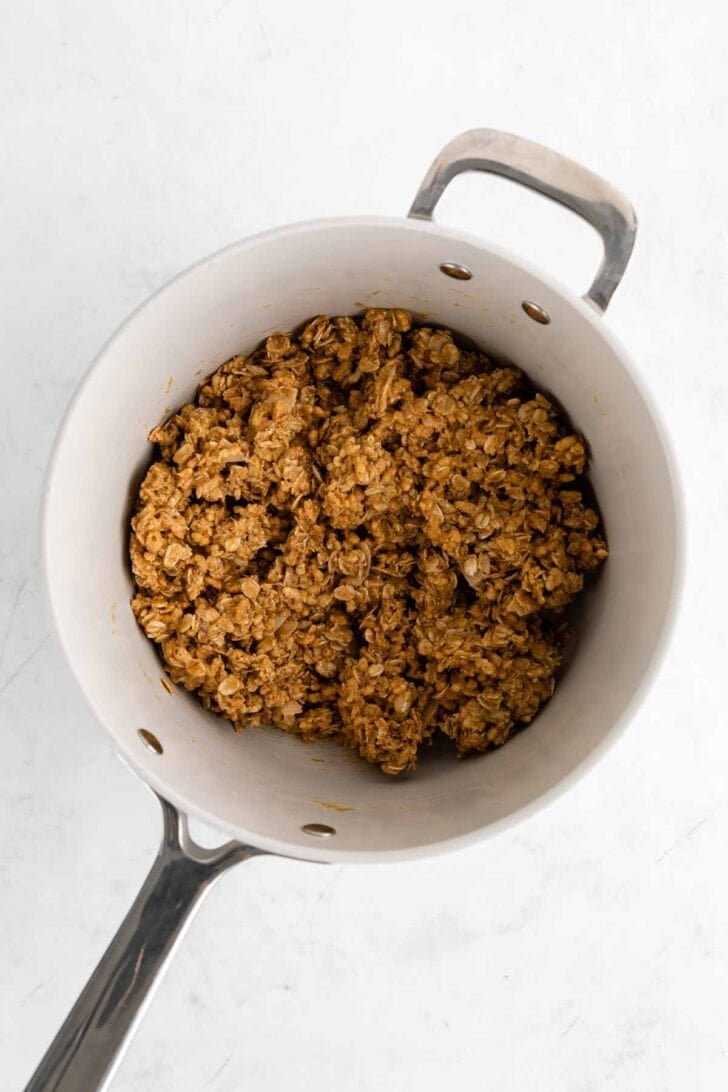 homemade coconut chocolate chip granola bars ingredients in a saucepan